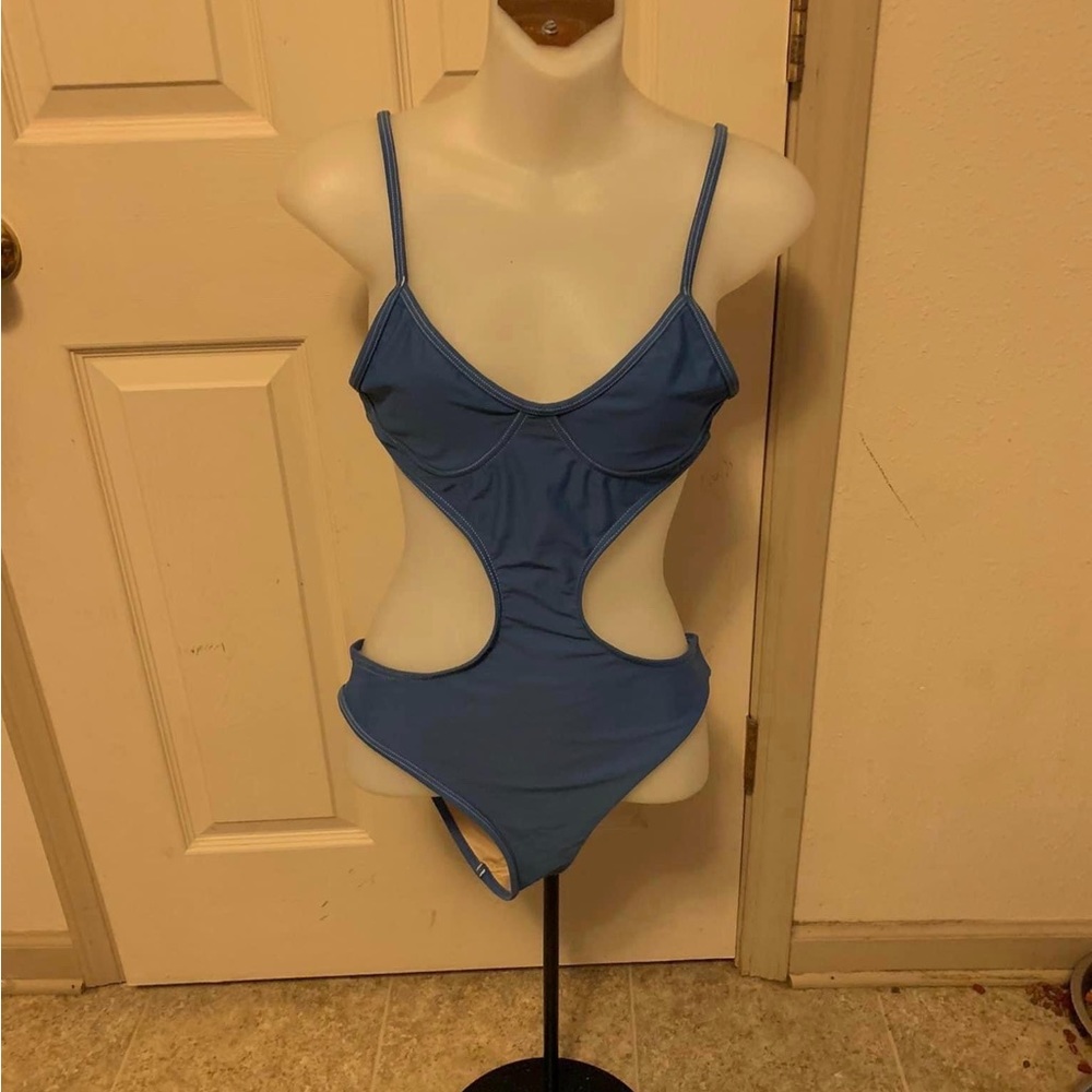 Size 6 blue Gnash xtra lite Lycra Swimwear cut out sides 1 piece swimsuit.